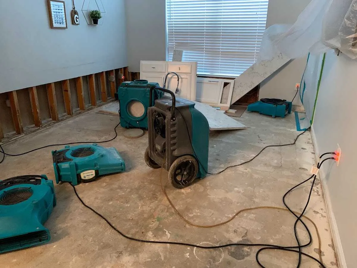 Dehumidifier in flood-cut room for Water Damage Restoration in Carrollton